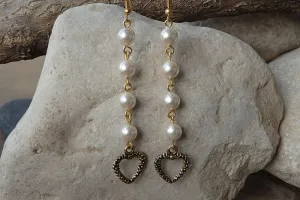 Heart pearl earrings.